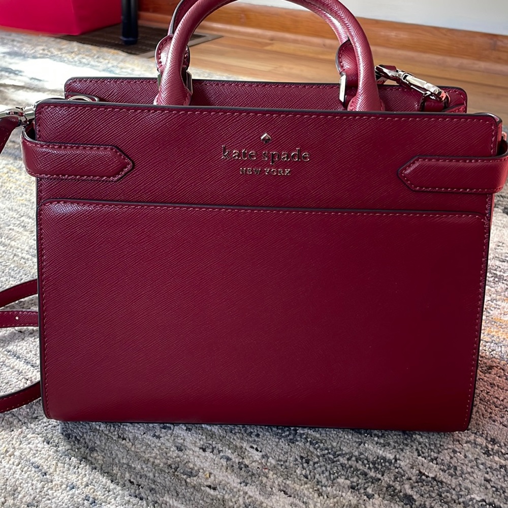 A new Kate Spade purse with two outside pockets